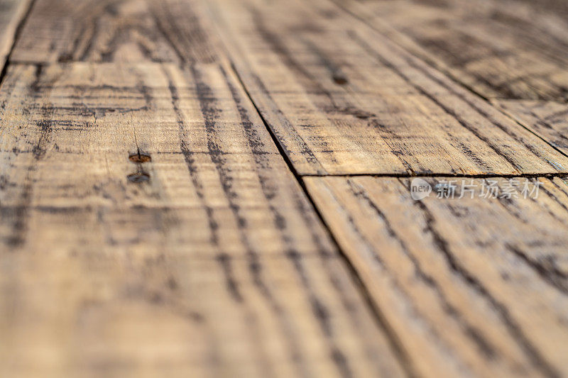 质朴的粗糙木质地板/桌面具有浅景深